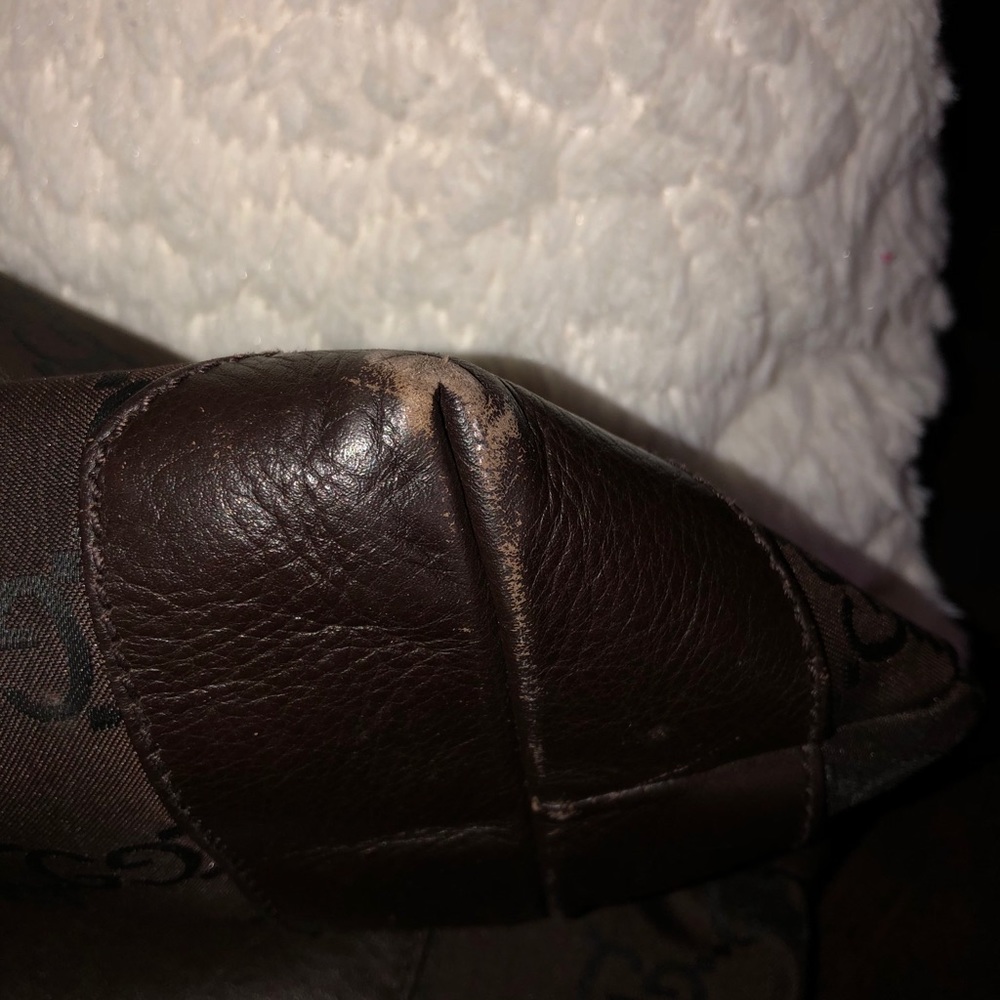 Brown Gucci tote bag.
